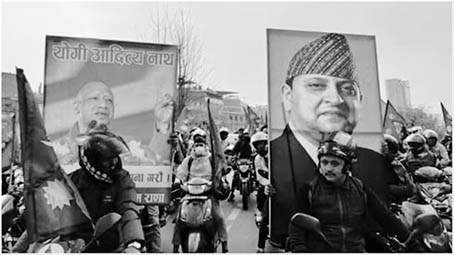 Nepal monarchists - royalist banners on bike "march"